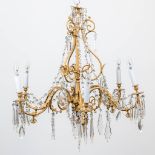 An antique gas chandelier, built with electricity. Bronze and glass bells. (93 x 80 cm)