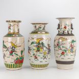 A collection of 3 vases made of Chinese porcelain 'Nanking' with images of warriors. (45 x 19 cm)