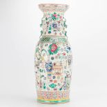 A Chinese vase with decor of antiquities. 19th/20th century. (60 x 23 cm)