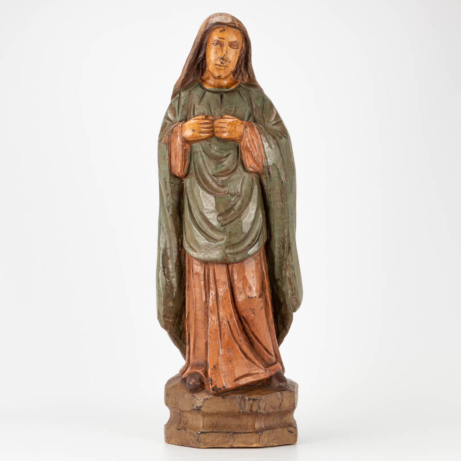 A wood sculpture of Madonna with polychrome. The second half of the 19th century. (12 x 22 x 57 cm)