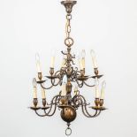 A large bronze Flemish chandelier with figurative soldier. The first half of the 20th century. (84 x