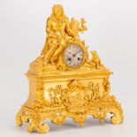 A table clock made of ormolu bronze with a sitting figurine. The second half of the 19th century. (1