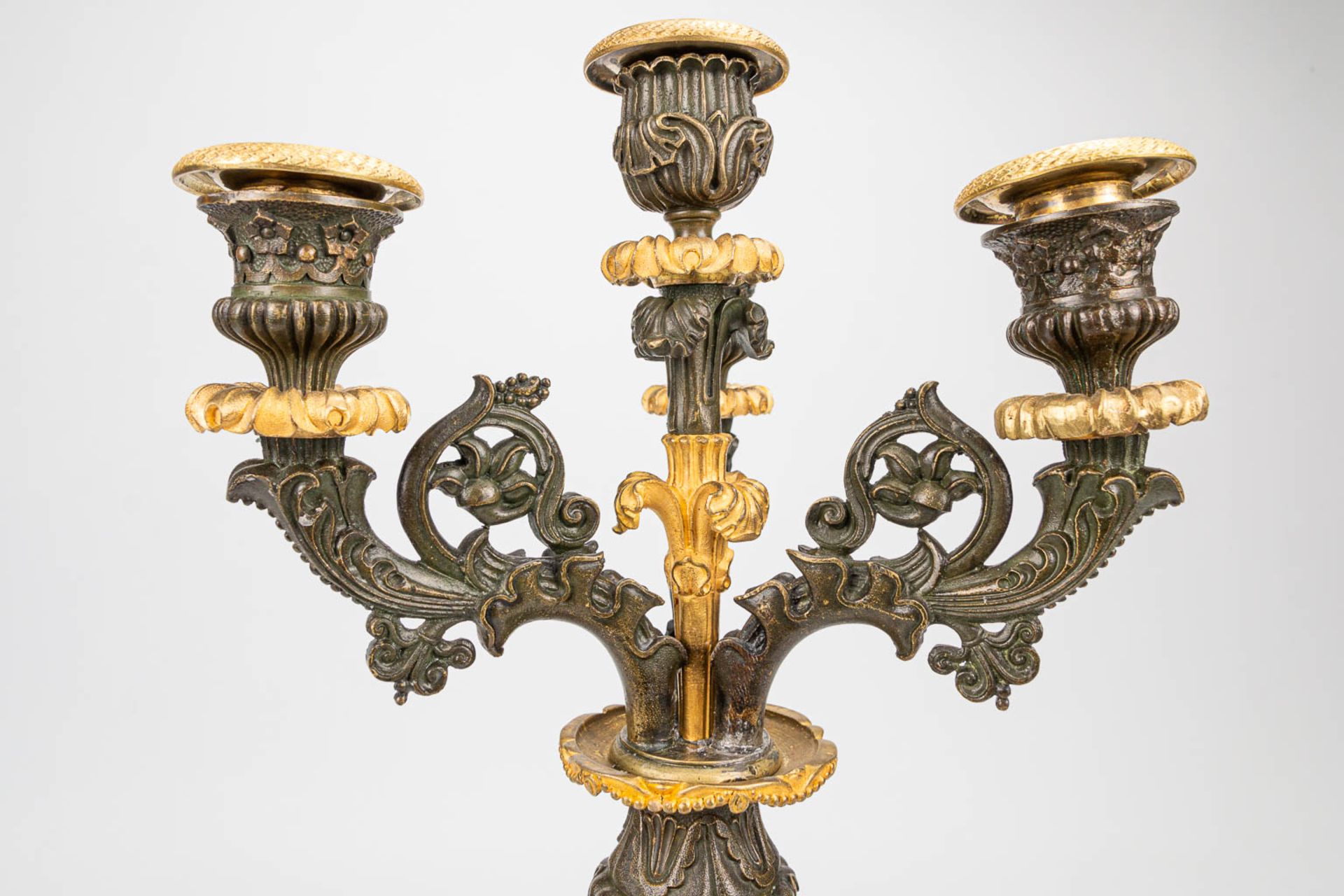 A pair of candelabra with gilt and patinated bronze in empire style, of the period. (16 x 20 x 51 cm - Image 5 of 6