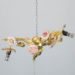 A chandelier ceiling lamp made of bronze with figurative angel with flowers. The first half of the 2