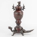 A Japanese bronze insence burner censer with figural dragon and tortoise. 19th century. (6 x 16 x 20