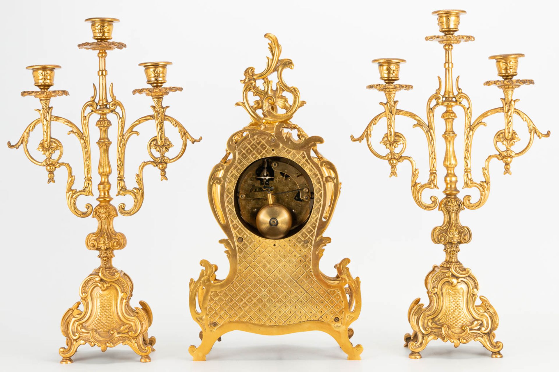 A 3 piece garniture clockset made of bronze, consisting of a clock and 2 candelabra. (9 x 22 x 41 cm - Image 10 of 17
