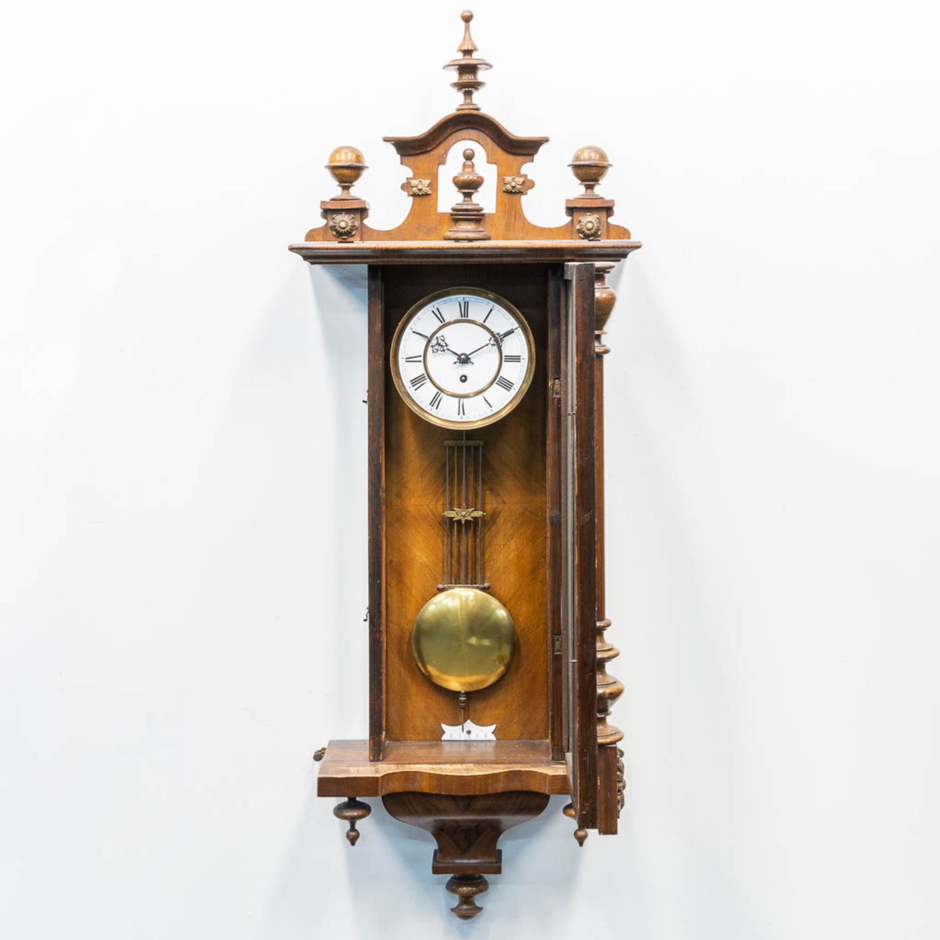 A wood hanging clock. The first half of the 20th century. (16 x 36,5 x 120 cm) - Image 2 of 13