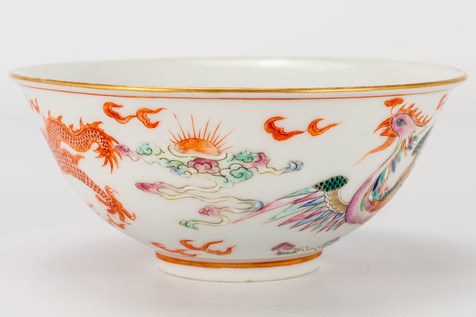A bowl made of Chinese porcelain with images of a dragon and phoenix, Guangxu, 19th century. (5 x 11 - Image 4 of 13