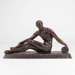 Joe DESCOMPS (1869-1950) and signed as 'J. Cormier' A bronze statue of a discus thrower. Cire perdue