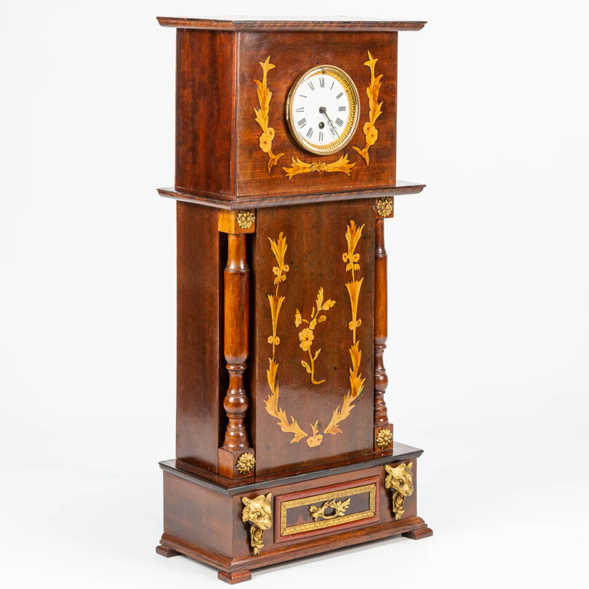 A table clock made of marquetry inlay, 19th century clock in a 20th century case. (17,5 x 34 x 73 cm