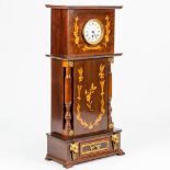 A table clock made of marquetry inlay, 19th century clock in a 20th century case. (17,5 x 34 x 73 cm