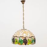 A hall lamp made of stained glass in Tiffany style. (30 x 49,5 cm)