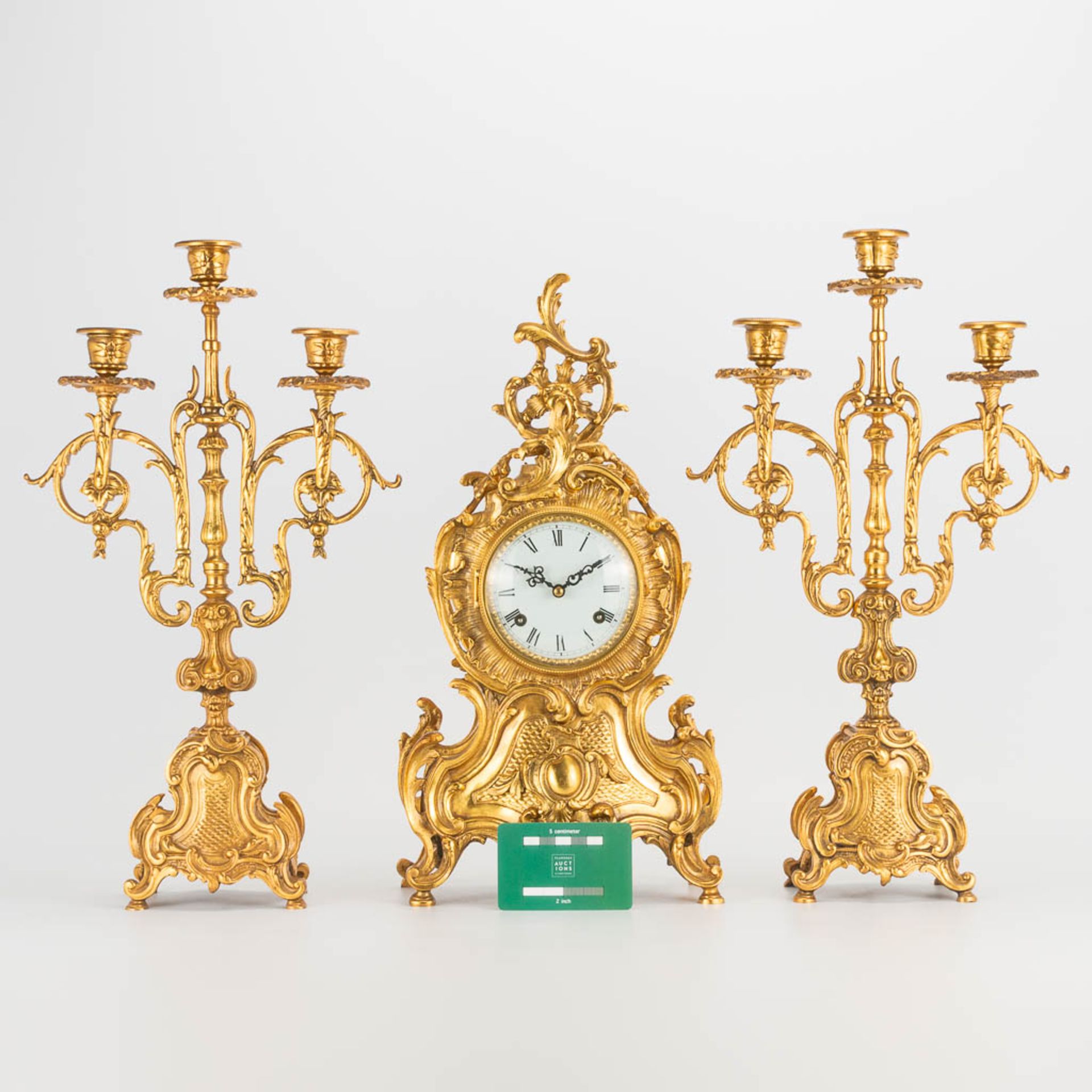 A 3 piece garniture clockset made of bronze, consisting of a clock and 2 candelabra. (9 x 22 x 41 cm - Image 3 of 17