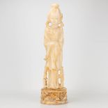 A statue of a Chinese figurine made of sculptured alabaster. (59 x 15 cm)