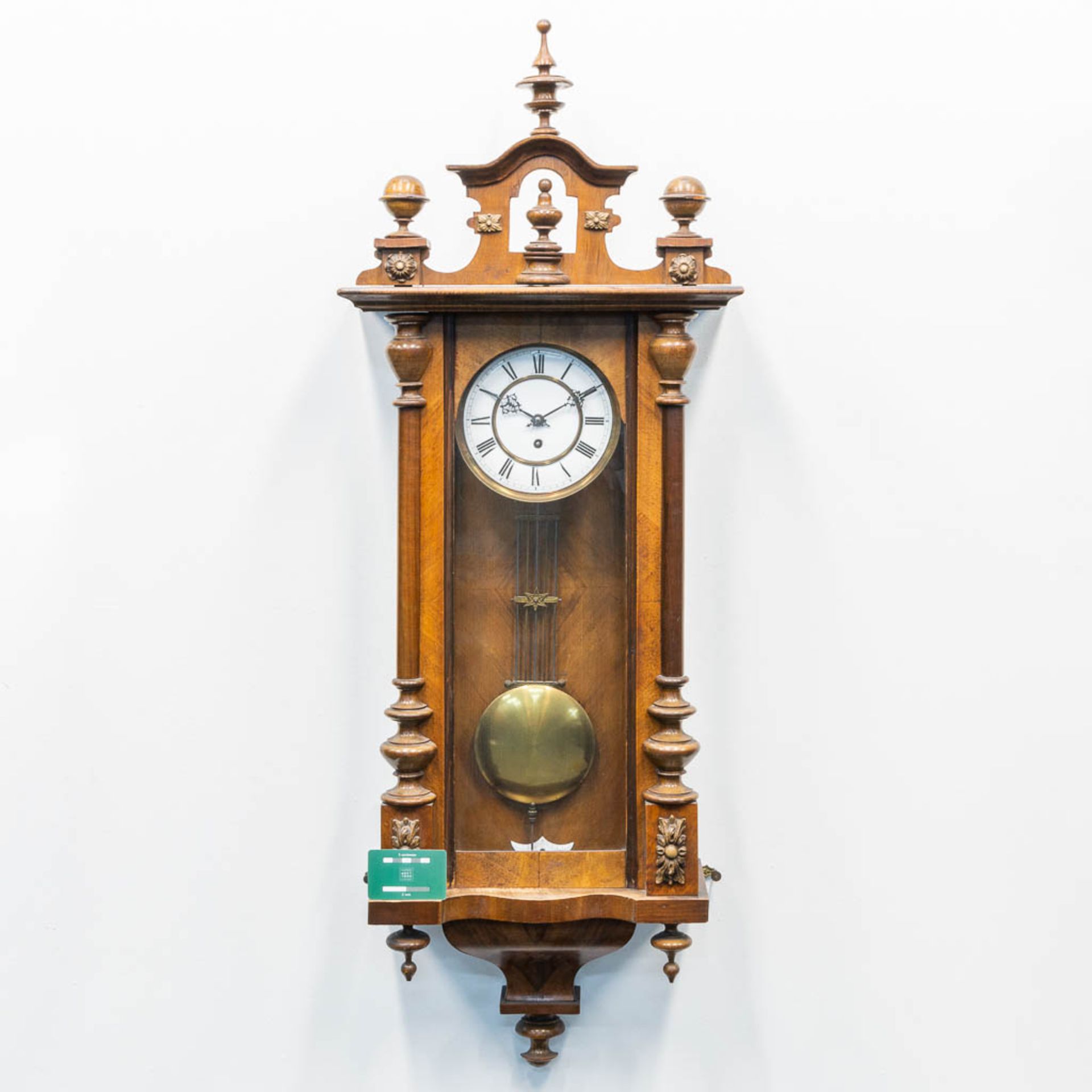 A wood hanging clock. The first half of the 20th century. (16 x 36,5 x 120 cm) - Image 3 of 13