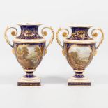 A pair of Derby English porcelain vases, with hand-painted decor, cobalt blue and gold pai