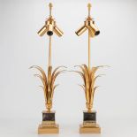 A pair of table lamps in Hollywood Regency style. The 2nd half of the 20th century. (62 x 21,5 cm)