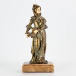 A statue made of spelter and bone, standing on an onyx base. Marked Tremo, made in France. First hal