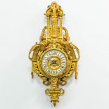 A cartel clock made of bronze in Louis XVI style. The second half of the 19th century. (12 x 25,5 x