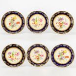 A set of 6 plates with hand-painted flower decor and finished with enamel, marked Porcelain Works Al
