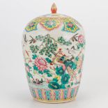 A Chinese porcelain ginger jar with decors of phoenixes and birds, playing children and wise men. 19