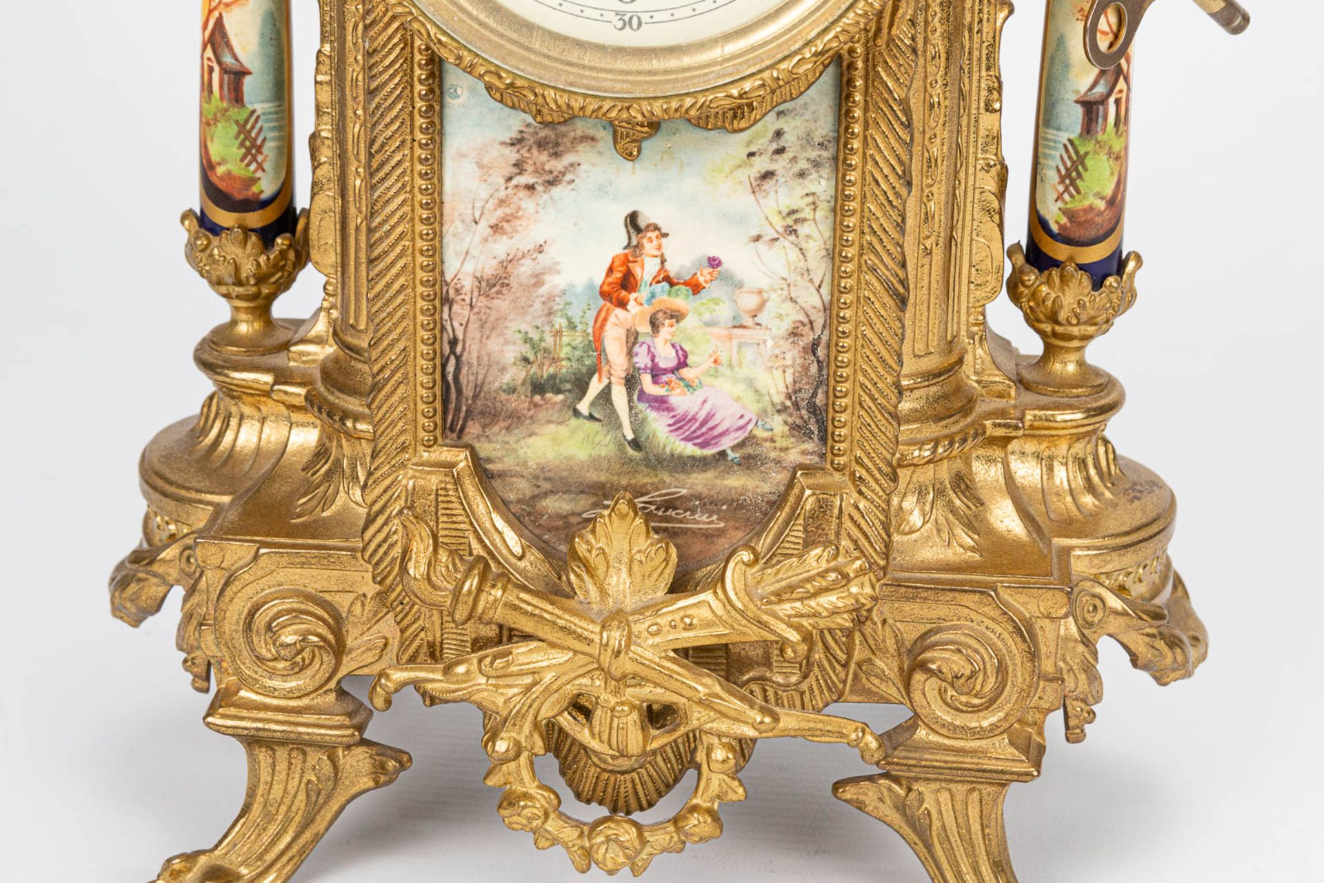 A three piece garniture clock made of bronze with porcelain. The second half of the 20th century. (1 - Bild 11 aus 11