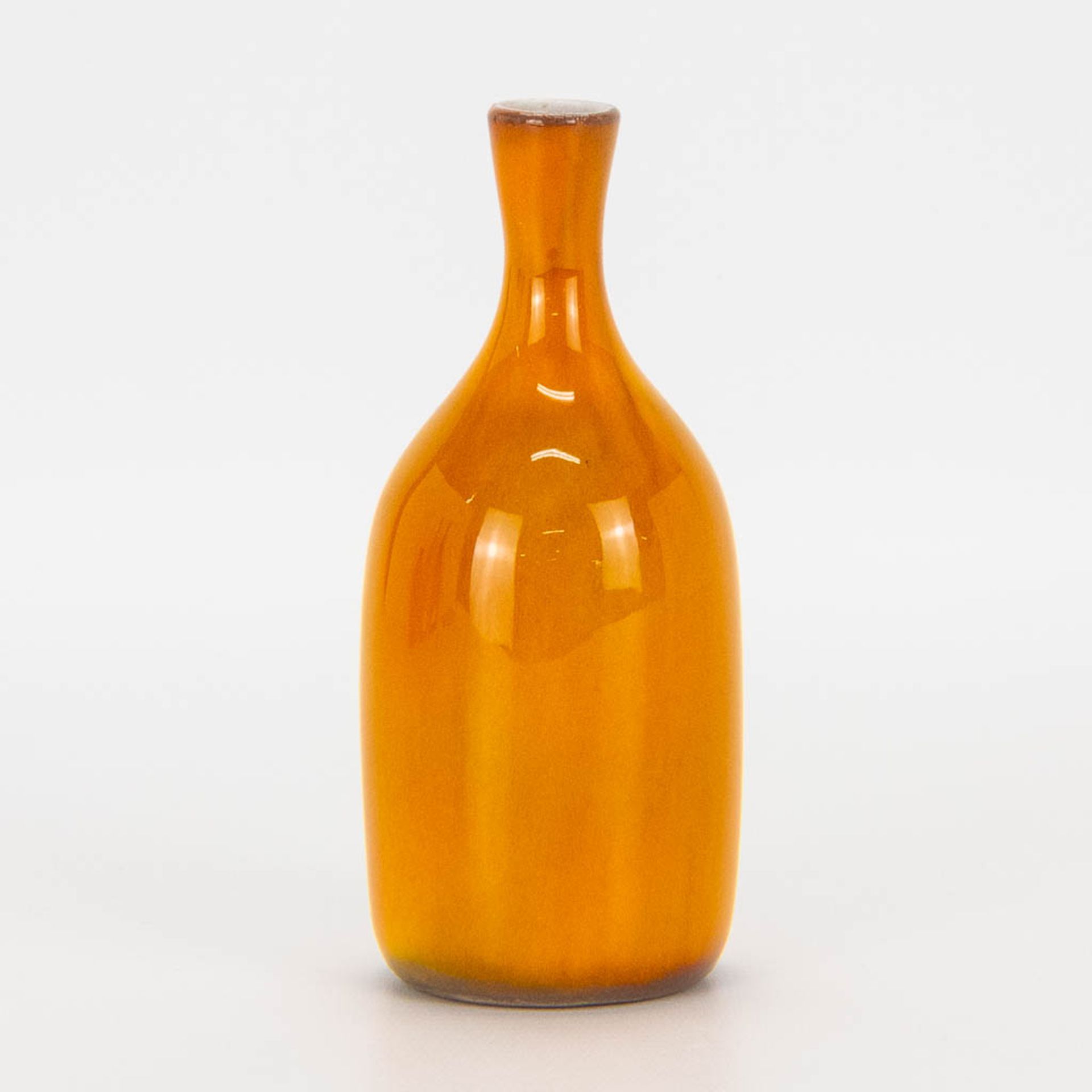 Jacques and Dani RUELLAND (XX-XXI) a soliflore vase with orange glaze. (15 x 6 cm)