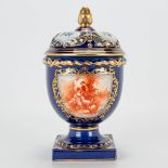A porcelain Potpourri jar with ajoured edges and hand-painted decor, marked Michelaud Freres, Limoge