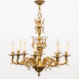 A chandelier made of bronze around 1960-1970. (67 x 64 cm)