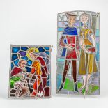 A collection of 2 hand-painted stained glass windows. (28,5 x 56 cm)