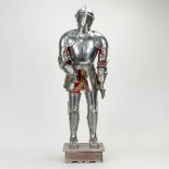 A statue made of body armour, made of metal. The second half of the 20th century. (32 x 34 x 100 cm)