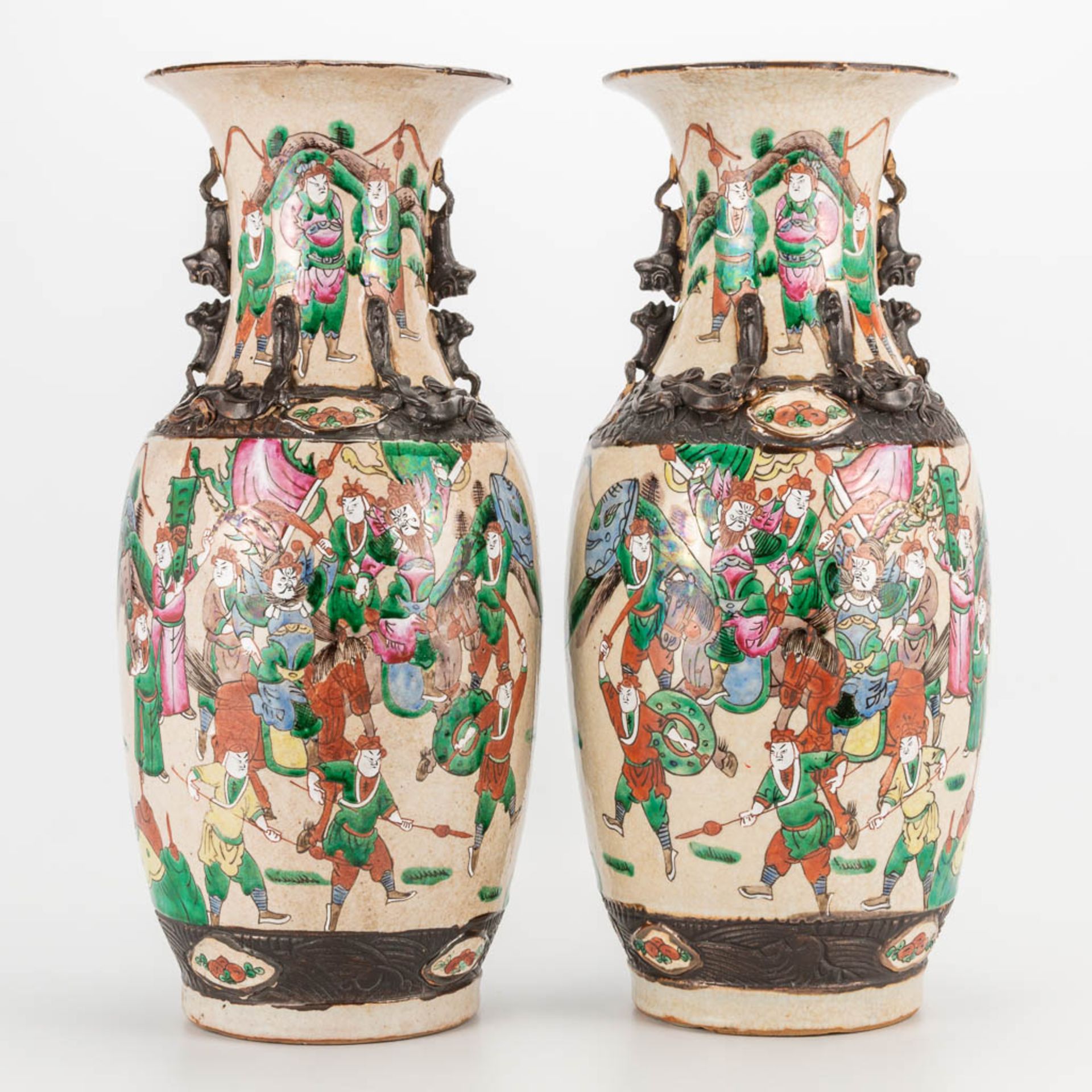 A pair of Nanking Chinese porcelain vases. (46 x 20 cm)