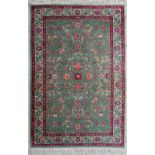 An Oriental hand-made carpet. Kerman. (130 x 200 cm)