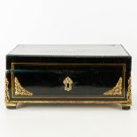 A Napoleon 3 jewelry box finished with gilt bronze and inlaid with tortoise shell. 19th century. (23