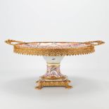 A large table centerpiece made of porcelain with hand-painted decor and mounted with bronze. Limoges