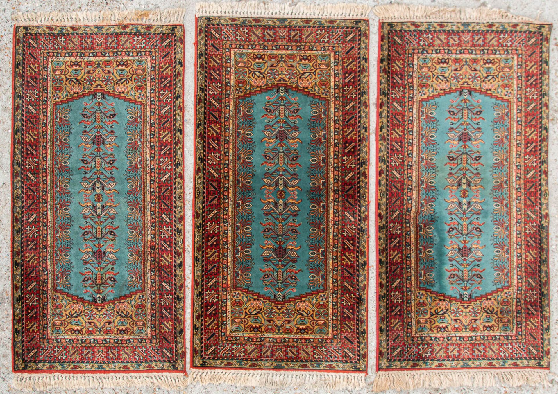 A set of 3 identical, Oriental carpets. (160 x 79 cm)