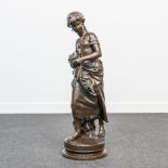 Mathurin MOREAU (1822-1912) a bronze statue of a young lady with flowers, standing on turning base,
