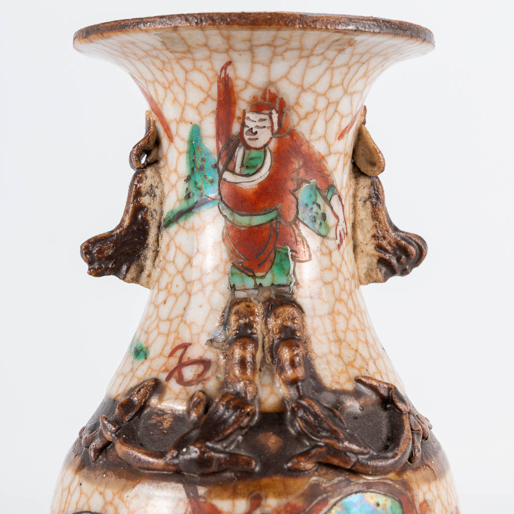 A pair of small Chinese vases Nanking with warrior decor. 19th/20th century. (19 x 8 cm) - Image 15 of 20