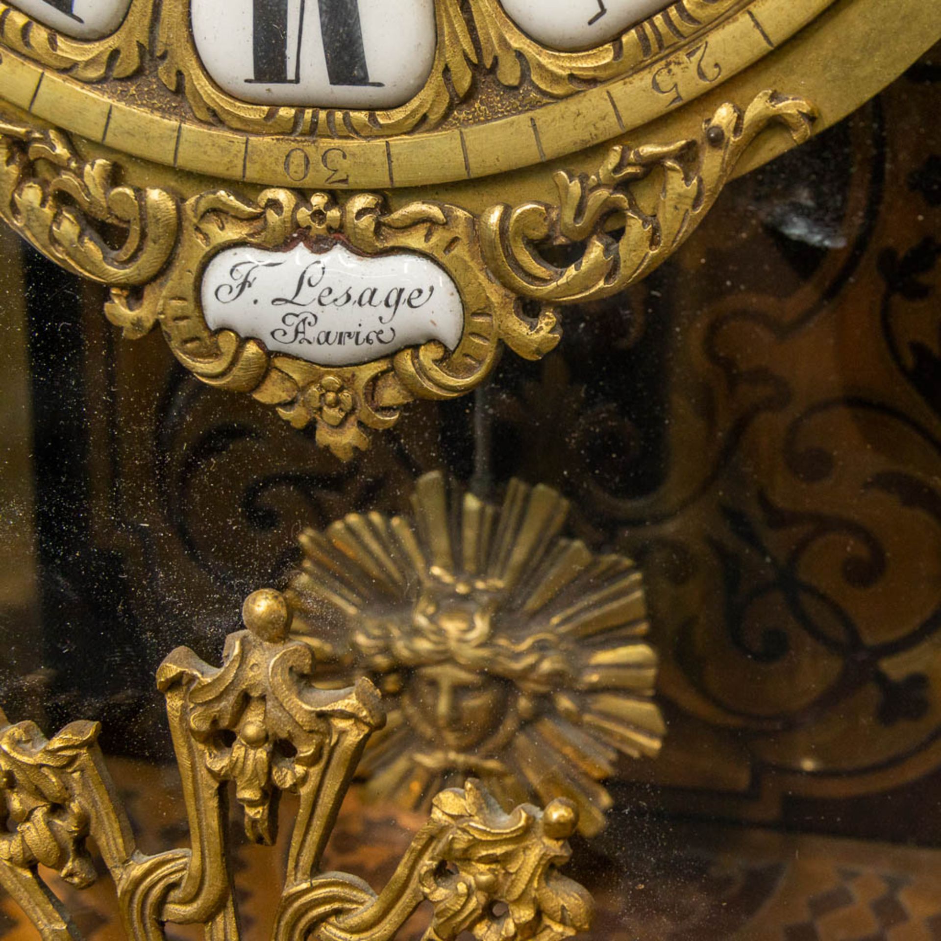 A cartel clock, finished with tortoise shell in a boulle technique, and mounted with gilt bronze. 19 - Image 5 of 10