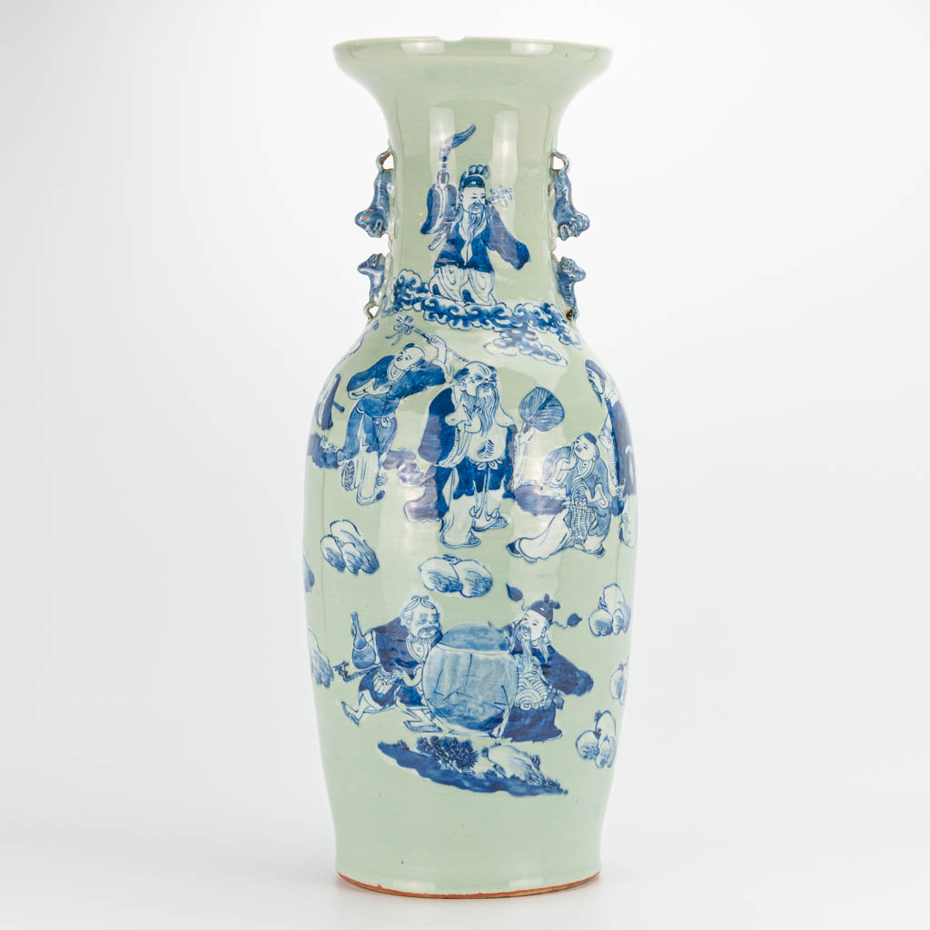 A Chinese vase with blue-white decor of immortals. 19th/20th century. (62 x 24 cm)