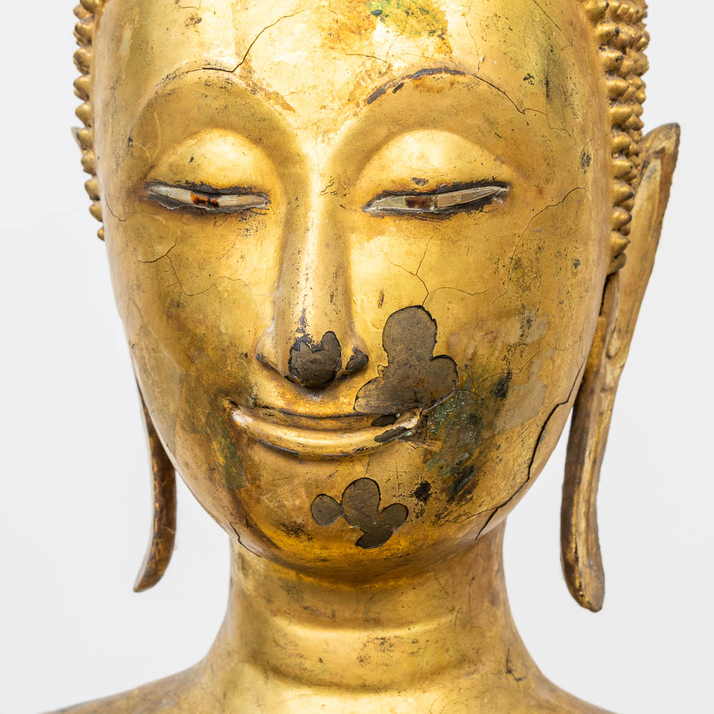 An antique buddha made of bronze and standing on a wood base. (28 x 48 x 180 cm) - Image 11 of 21