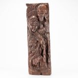 A wood sculpture of the holy family. (5,5 x 19 x 61 cm)