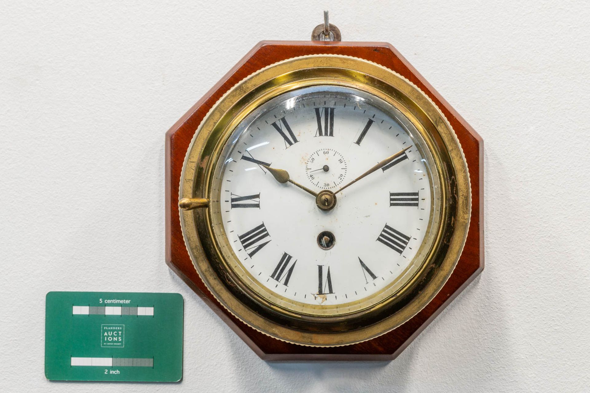 A ship clock mounted on wood, the first half of the 20th century. (9 x 20 cm) - Image 7 of 7