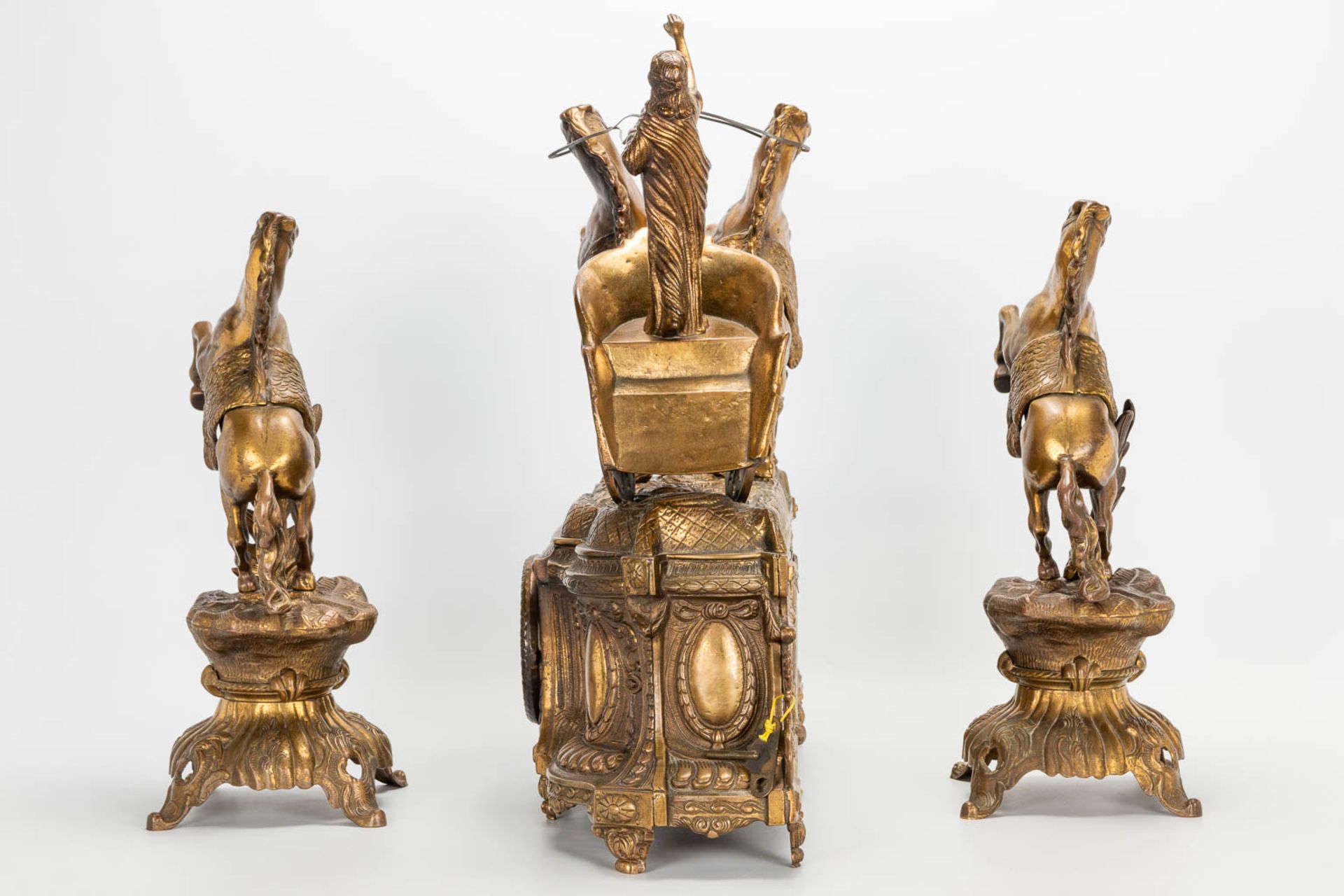 A 3 piece garniture clockset made of bronze, consisting of a clock with battle cart and 2 side piece - Image 7 of 18