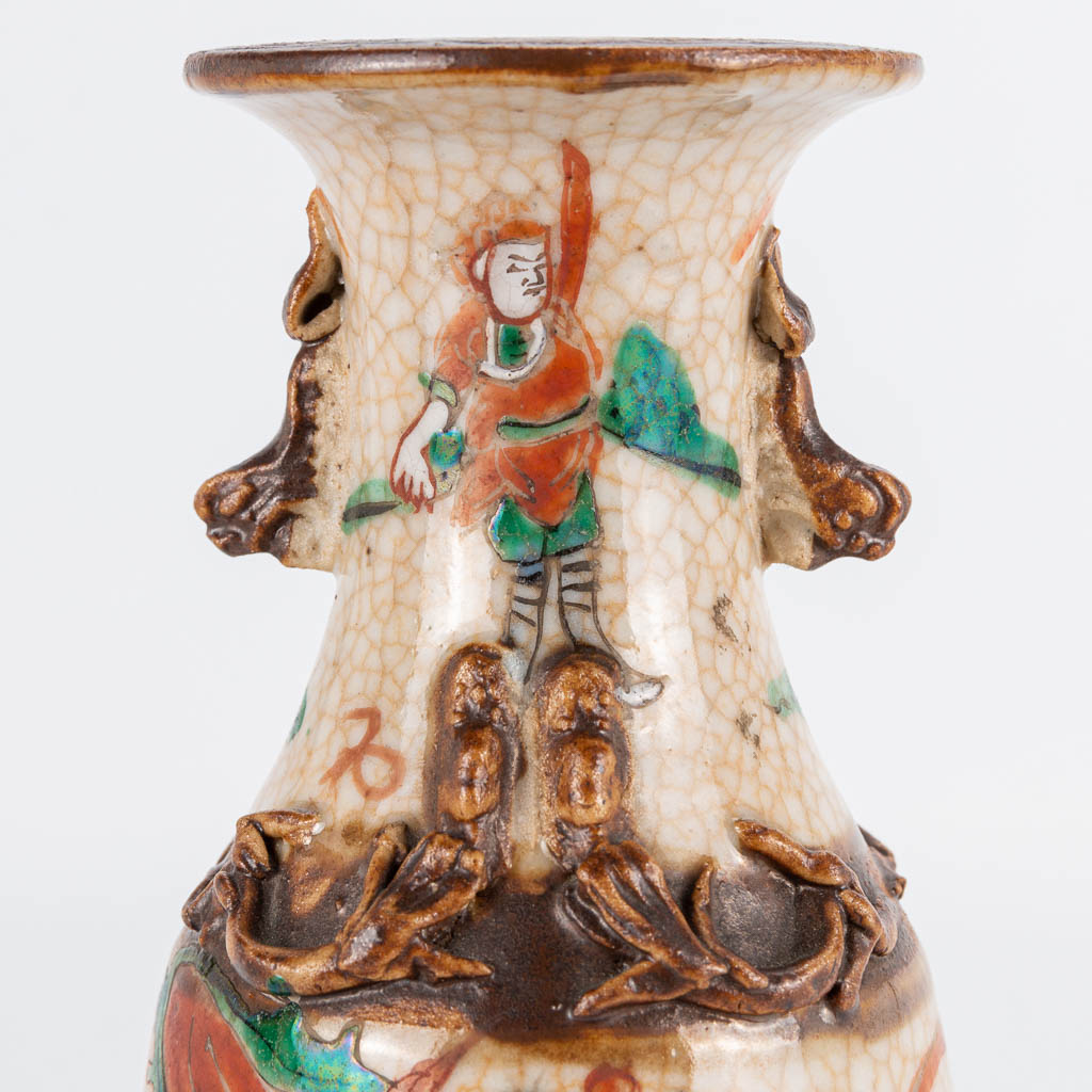 A pair of small Chinese vases Nanking with warrior decor. 19th/20th century. (19 x 8 cm) - Image 14 of 20