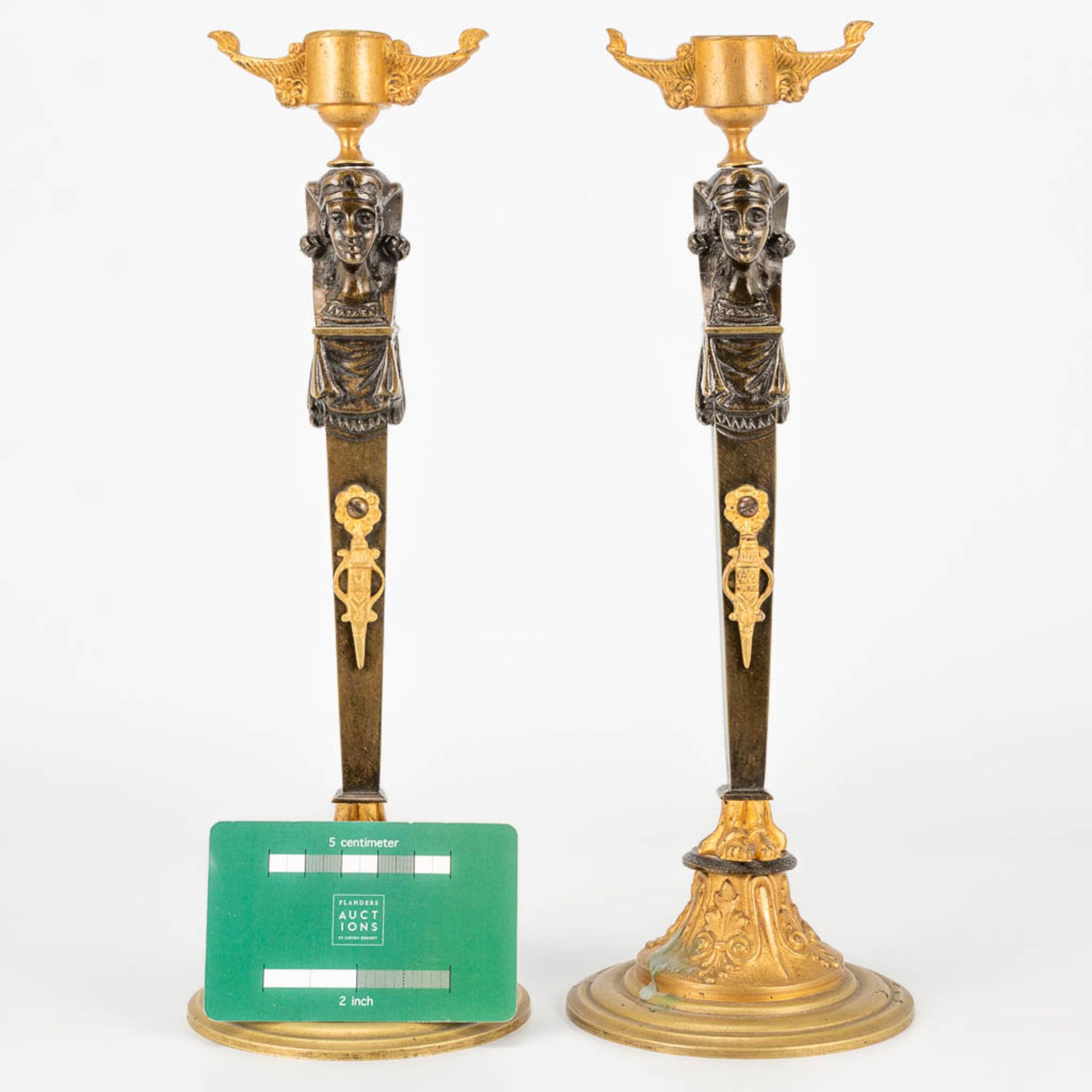 A pair of candlesticks made of gilt and patinated bronze in empire style. (27,5 x 9,5 cm) - Image 11 of 15