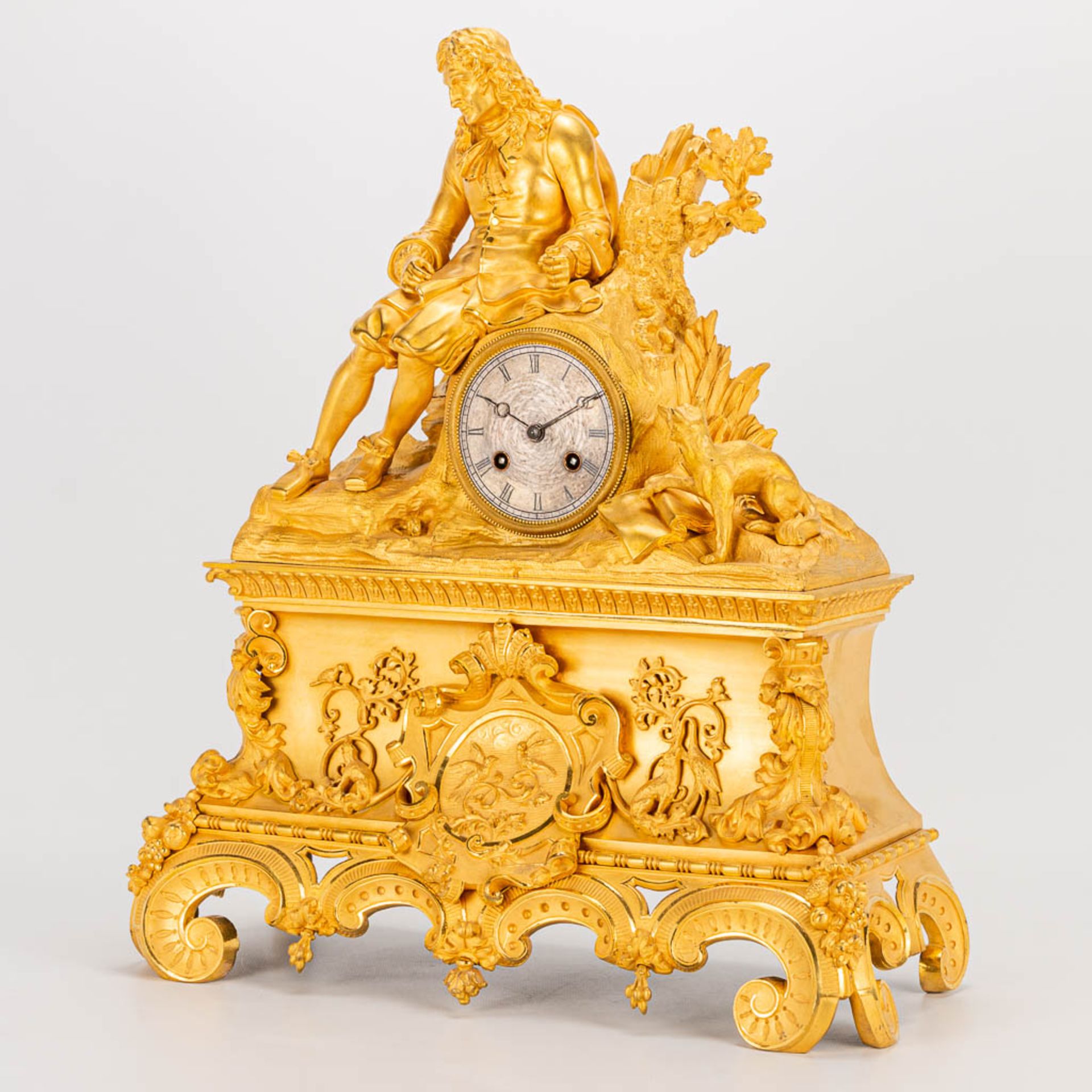 A table clock made of ormolu bronze with a sitting figurine. The second half of the 19th century. (1 - Image 10 of 24