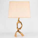 Michel JAUBERT (XX-XXI) Table lamp made of polished bronze and marked on the base. (16,5 x 10 x 34 c