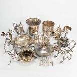 A very large collection of silver-plated items, champagne coolers, candelabra, bottle holders.