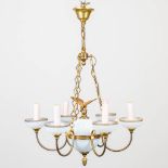 A chandelier in empire style made of bronze with opaline glass. Added: 2 wall lamps. (62 x 50 cm)